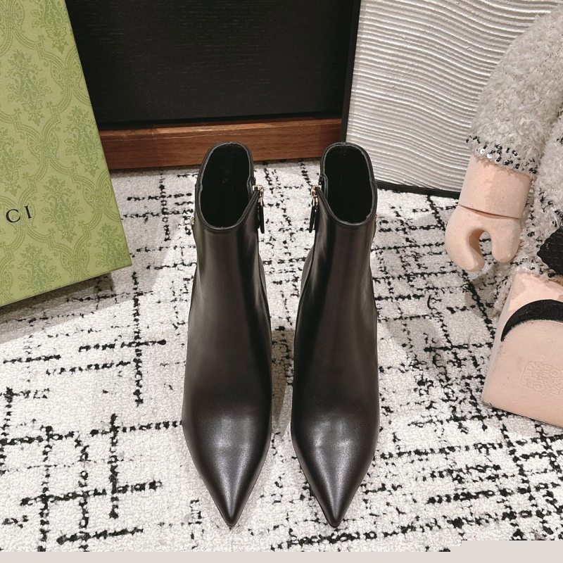 G*u*i boots